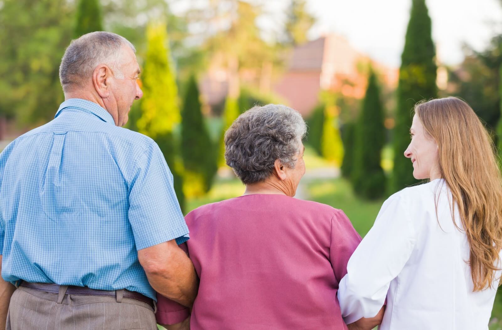 Caregiver helping their senior parents in assisted living